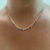 Choker pontinhos coloridos folheado a ouro 18k