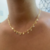 Choker estrela com ponto de luz folheado a ouro 18k