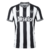 Camisa Newcastle Home 23/24 Torcedor Castore Masculina - Branca e Preta