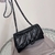 Balenciaga Crush Quilted Crinkle Leather Black Bag: An elegant bag from Balenciaga, made from quilted and crinkled leather in black, adding a touch of sophistication to your style.