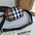 Burberry Brown Paddy Crossbody Bag: An elegant brown crossbody bag from Burberry, perfect to complete any look with style and sophistication.