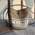 Celine Bucket Nano Textile Bag "Brown": A small, elegant bag from Celine in brown, ideal for casual occasions or a relaxed outing.