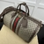 Gucci Savoy Medium Duffle "Beige and Ebony GG Supreme" Travel Bag: An elegant Gucci travel bag in beige and brown tones, featuring the distinctive GG Supreme pattern and high-quality leather trim.