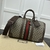 Gucci Savoy Small Duffle "Beige and Ebony GG Supreme" Travel Bag: A luxurious beige and brown Gucci travel bag featuring the iconic GG Supreme pattern and high-quality leather details.