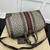 Gucci Savoy Small Duffle "Beige and Ebony GG Supreme" Travel Bag: A luxurious beige and brown Gucci travel bag featuring the iconic GG Supreme pattern and high-quality leather details.