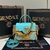 Fendace Fendi × Versace La Medusa Medium Baroque Bag Gold/Blue: An elegant and luxurious bag, with details in gold and blue, combining the distinctive style of Fendi and Versace, evoking baroque design.