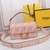 Fendi Baguette Bag in Canvas FℲ Pink: A charming Fendi Baguette bag in canvas with the iconic FF monogram in pink, perfect for adding a touch of elegance to your look.