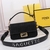 Fendi Baguette Bag in Canvas FℲ Black: An elegant Fendi Baguette Bag in canvas featuring the iconic FF monogram in black, adding a touch of sophistication to your style.