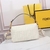 Fendi Baguette Bag in Canvas FℲ White: A stunning Fendi Baguette bag in canvas featuring the iconic FF monogram in white, adding a touch of sophistication to your style.