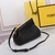 Fendi First Small Interlaced Leather Bag Negro: Un pequeño bolso de Fendi, en piel entrelazada negra, elegante y versátil para ocasiones informales o formales.