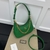 Bolsa Gucci Aphrodite Pequena de Ombro Verde: Uma bolsa de ombro em um tom verde vibrante, ideal para adicionar um toque de cor e elegância ao seu visual.