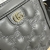 Gucci GG Matelasse Top Handle Mini Leather "Gray" Bag: A small gray leather bag from Gucci, with a matelassé pattern and top handle, ideal for a sophisticated and discreet style.