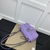 A Gucci Marmont Medium bag in purple, known for its elegant and versatile design. This bag is roomy and practical, ideal for daily use or casual occasions. With matelassé details and Gucci's emblematic GG clasp, it's a sophisticated choice for those looki