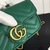 Gucci Marmont Super Mini Chevron Matelassé Bag in Green: An elegant small bag with a chevron pattern in matelassé, in green, perfect for adding a touch of vibrant style to your look.