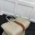 Gucci Ophidia GG Medium Tote Bag in Pink and White: An elegant medium bag from Gucci, with GG pattern and pink leather details, ideal for a feminine and sophisticated look.