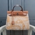 Hermès 2021 Toile Brides de Gala Herbag Zip 31 in Beige and Brown: This bag features an exclusive design with elegant details, perfect for those looking for style and sophistication in their fashion accessory.