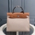 Bolsa Hermès Herbag Zip 31 Canvas Cream/Brown: Uma bolsa elegante em creme e marrom, perfeita para adicionar sofisticação ao seu visual.