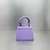 Jacquemus Le Chiquito Noeud Leather Purple Bag: A small bag in purple leather with bow detail, perfect for adding a touch of sophistication and color to your look.