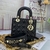 Lady Dior Small Cannage Lambskin Black Bag: Luxury bag in black leather with Dior's iconic cannage pattern, perfect for a sophisticated and elegant look on any occasion.