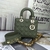 Bolso Lady Dior Small Cannage Lambskin Green: Bolso de lujo en piel verde, con el famoso patrón cannage de Dior, ideal para añadir un toque de color y estilo a cualquier look elegante.