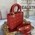 Lady Dior Small Cannage Lambskin Red Bag: Elegant red leather bag, with Dior's classic cannage pattern, ideal for adding a touch of sophistication and vibrant style to your look.