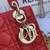 Bolsa Lady Dior Small Cannage Lambskin Red: Elegante bolsa em couro vermelho, com o clássico padrão cannage da Dior, ideal para adicionar um toque de sofisticação e estilo vibrante ao seu visual.