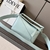 Loewe Small Puzzle Grained Calfskin Bag in Aquamarine: An elegant Loewe Puzzle bag in grained leather in aquamarine, perfect for adding a touch of sophistication and style to your look.