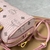 Bolsa MCM Mini "Pink": Uma bolsa mini da MCM na cor rosa, vibrante e moderna, perfeita para adicionar um toque de cor ao seu visual.