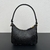 Bolsa Prada Mini em Couro Saffiano Black: Uma bolsa mini da Prada em couro saffiano preto, ideal para complementar qualquer look com elegância e sofisticação.