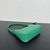 Bolsa Prada Mini em Couro Saffiano Green: Uma bolsa mini da Prada em couro saffiano verde, perfeita para adicionar um toque de cor e estilo aos seus looks.