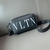 A Valentino Garavani Crossbody bag in black, known for its elegant and timeless design. This bag is perfect for everyday use or special occasions, offering practicality and style. With high-quality leather details and the iconic Valentino logo, it is a re