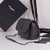 Bolso Yves Saint Laurent Niki Dark Grey": Un sofisticado bolso en color gris oscuro de Yves Saint Laurent, ideal para un estilo urbano y contemporáneo.