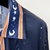 A Casablanca silk shirt with Cuban collar and "L'Arche Du Desert Nuit" prints, perfect for a stylish, contemporary look.