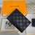 Louis Vuitton Black Passport Cover: An elegant and luxurious black Louis Vuitton passport cover featuring the iconic LV monogram.