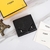 Fendi Bad Bugs Wallet in Total Black: A stylish wallet from Fendi, featuring the distinctive Bad Bugs design in black, ideal for a sophisticated and modern look.