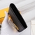 Fendi Bad Bugs Wallet in Black and Yellow: This Fendi wallet showcases the iconic Bad Bugs design in black and yellow, perfect for adding a touch of style and personality to your look.