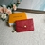 Louis Vuitton Key Pouch Monogram Empreinte Cerise wallet in red: a vibrant and luxurious accessory to organize your keys with elegance.