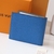 Louis Vuitton Marco NM Taiga Blue Wallet: An elegant Louis Vuitton men's wallet in blue Taiga leather, perfect for organization and refined style.