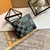 Louis Vuitton Multiple Damier Canvas Wallet Green/Black: An elegant luxury wallet from Louis Vuitton with a Damier pattern in green and black, ideal for those seeking sophistication and style.