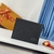 Louis Vuitton "Black" Clutch: An elegant clutch in solid black, perfect to complement any sophisticated or casual look.