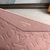 Pink Louis Vuitton Mélanie BB Clutch: a delicate and elegant accessory to add a touch of femininity and style to your look.