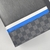 Louis Vuitton MM Pochette Voyage Clutch in blue and black: an elegant handbag perfect for travel or evening events.