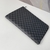 Clutch Louis Vuitton Pochette Joule GM "Damier Graphite": un elegante bolso con estampado de cuadros en tonos grises, ideal para ocasiones formales o casuales.