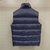 Dior Oblique Down "Dark Blue" Vest: A dark blue vest from Dior with the oblique pattern, perfect for an urban and sophisticated look on cold days.