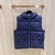 Gucci GG Canvas "Blue" Vest: A blue Gucci vest with the iconic GG pattern, for a touch of elegant, modern style for any occasion.