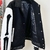 Chaqueta Amiri Varsity "Negro/Blanco" en internet