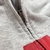 Balenciaga Archive Series Connected Zip-up Hoodie Medium Fit "Grey/Red": A gray sweatshirt with red details from Balenciaga, part of the Archive series, for a modern, connected urban look.