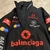 Jaqueta Balenciaga Top League "Black": Uma jaqueta preta da Balenciaga, parte da coleção Top League, para um visual esportivo e urbano de alta moda.