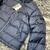 Dior Oblique Down "Dark Blue" Jacket: Dark blue Dior jacket with an oblique pattern, ideal for an urban and sophisticated style in cold climates.