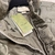 Gucci Jumbo GG Canvas Down "Green" Jacket: A green GG pattern quilted jacket from Gucci, perfect for cold weather and urban style.